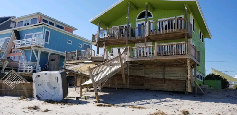 Storm surge damage to a wooden deck and concrete foundation in Surf City, North Carolina, caused by Hurricane Florence in 2018. (Source: AIR)